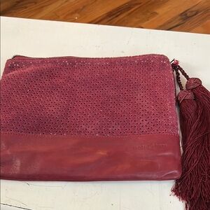 Chic Red Clutch with Tassel and wristlet.By: Mata Hari great finishing touches